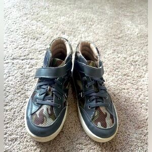 Old soles little kid sneakers.